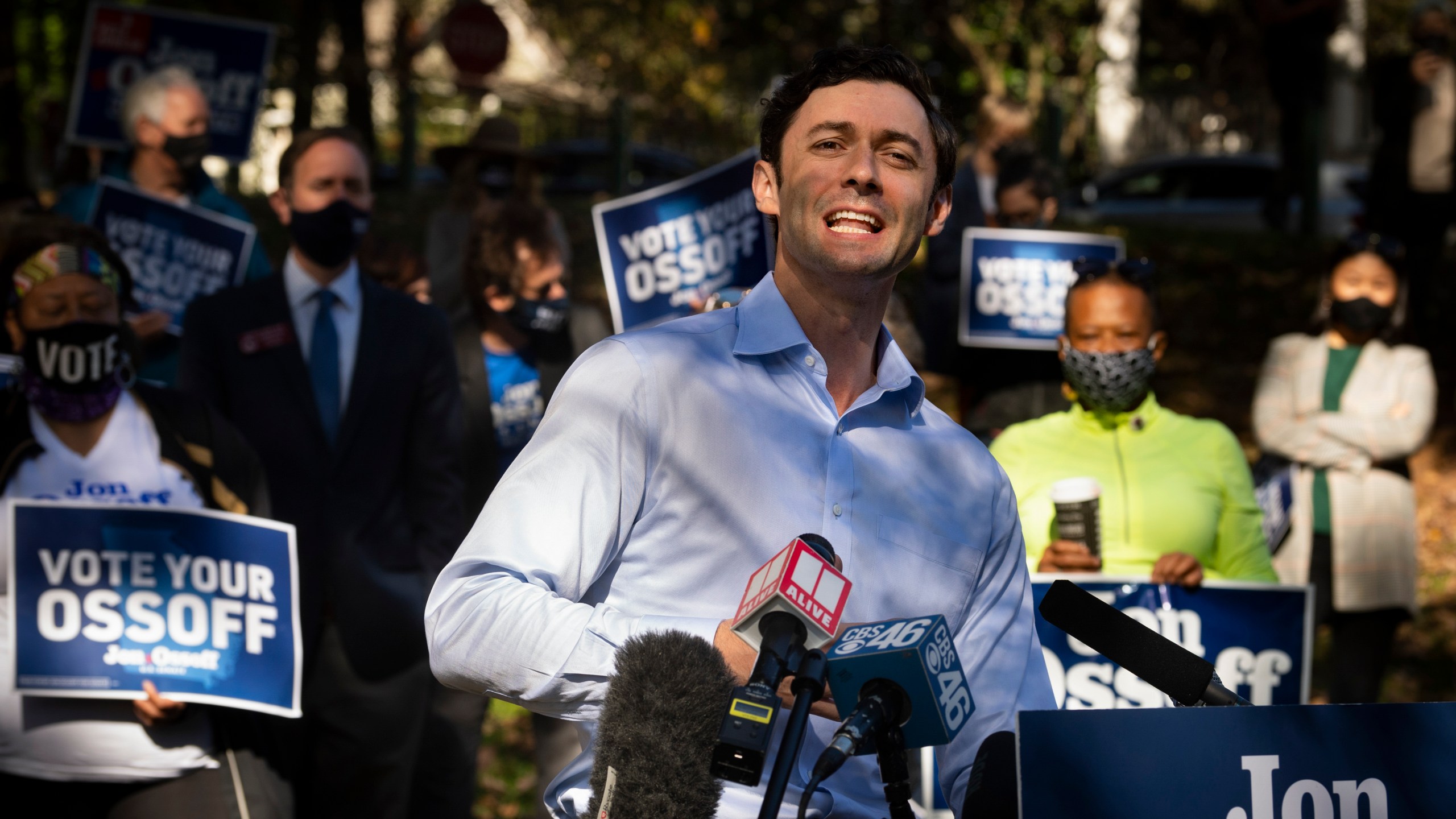 Georgia Democratic candidate for U.S. Senate Jon Ossoff speaks to the media as he rallies supporters for a run-off against Republican candidate Sen. David Perdue, as they meet in Grant Park, Friday, Nov. 6, 2020, in Atlanta. (John Amis/AP Photo)