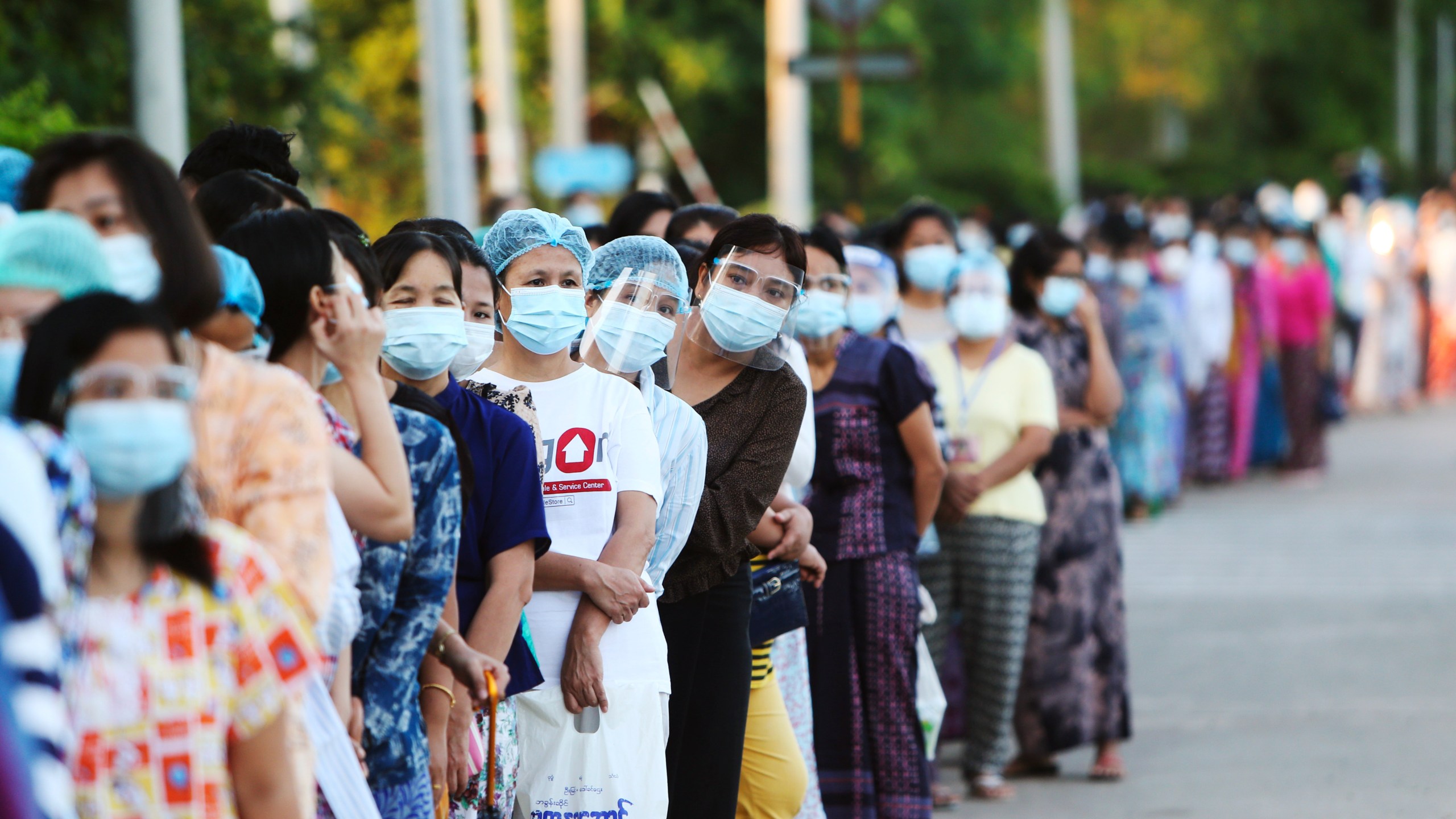 Voters line up to cast their ballots at a polling station Sunday, Nov. 8, 2020, in Naypyitaw, Myanmar. (Aung Shine Oo/AP Photo)