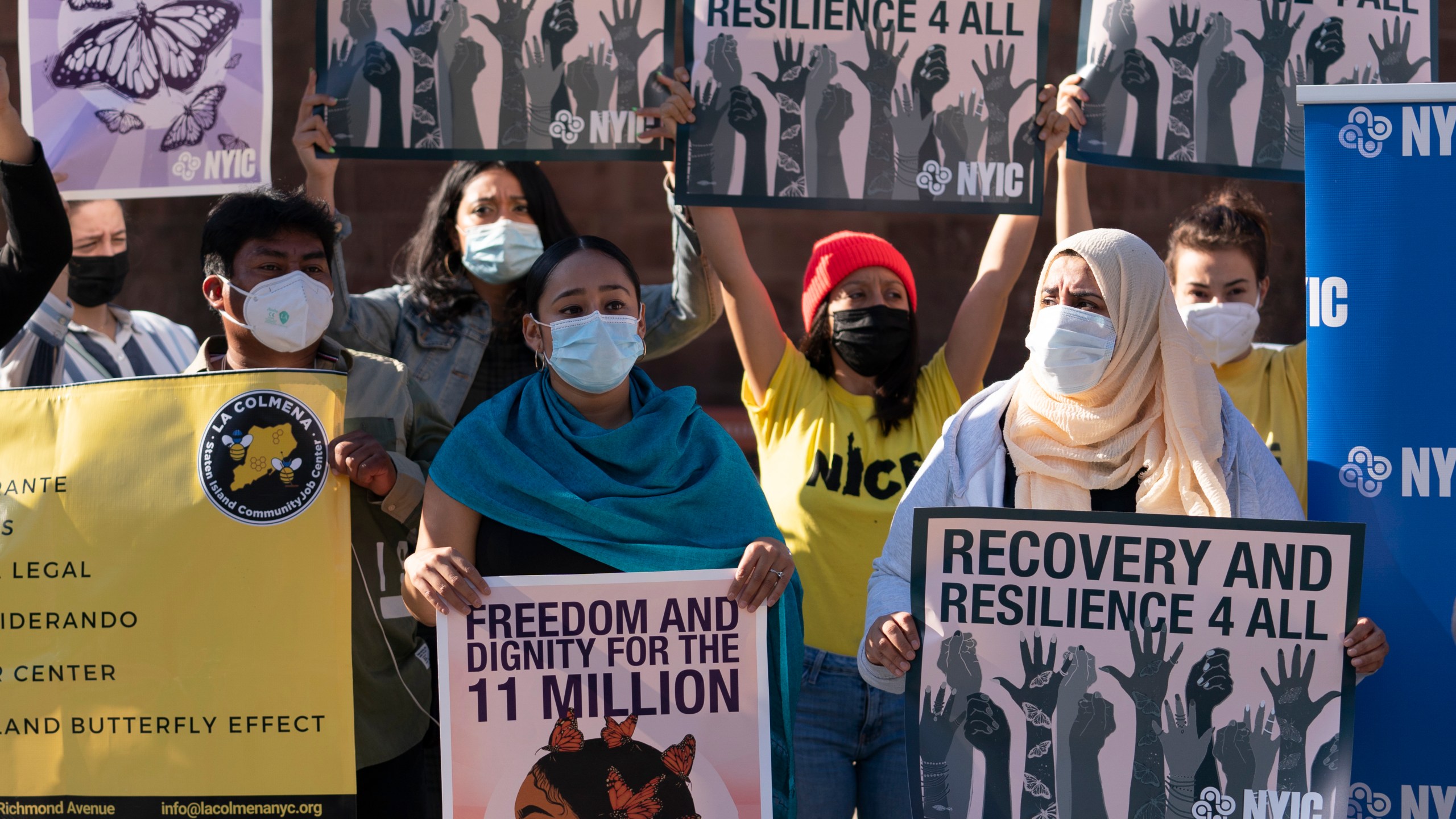 Demonstrators with the New York Immigration Coalition rally asking President-elect Joe Biden to prioritize immigration reform, Monday, Nov. 9, 2020, in New York. (AP Photo/Mark Lennihan)