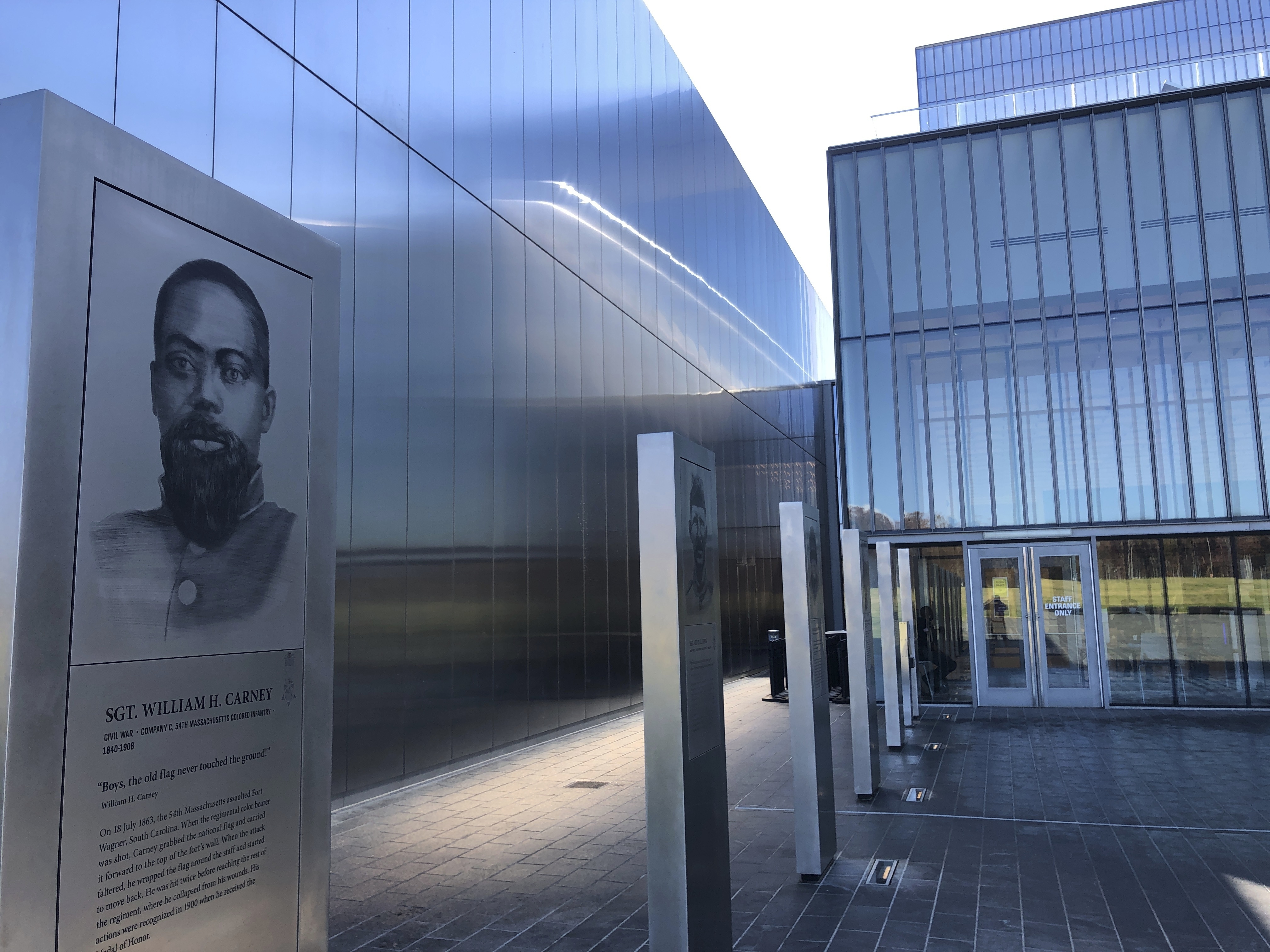 A marker commemorating the service of Sgt. William Carney, a former slave who served in the 54th Massachusetts Colored Infantry Regiment and became the first African American Medal of Honor recipient, is displayed outside the new National Museum of the United States Army on Nov. 10, 2020, in Fort Belvoir, Va. (Matthew Barakat / Associated Press)