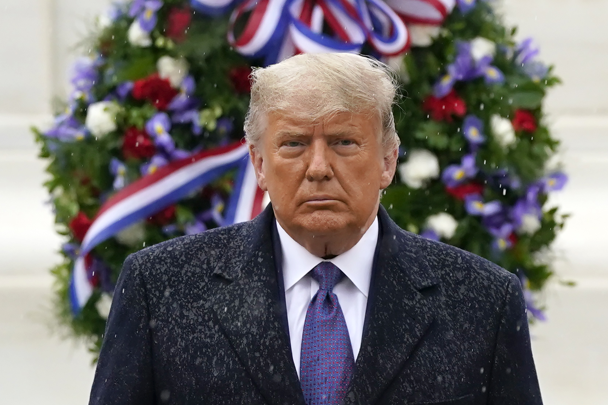 Donald Trump participates in a Veterans Day wreath laying ceremony at the Tomb of the Unknown Soldier at Arlington National Cemetery in Arlington, Va., Wednesday, Nov. 11, 2020. (AP Photo/Patrick Semansky)