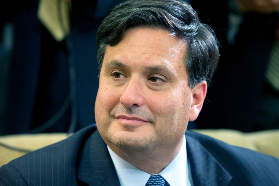 In this Oct. 22, 2014, file photo, Ron Klain listens as President Barack Obama speaks to the media about the government's Ebola response in the Oval Office of the White House in Washington. (AP Photo/Jacquelyn Martin, File)