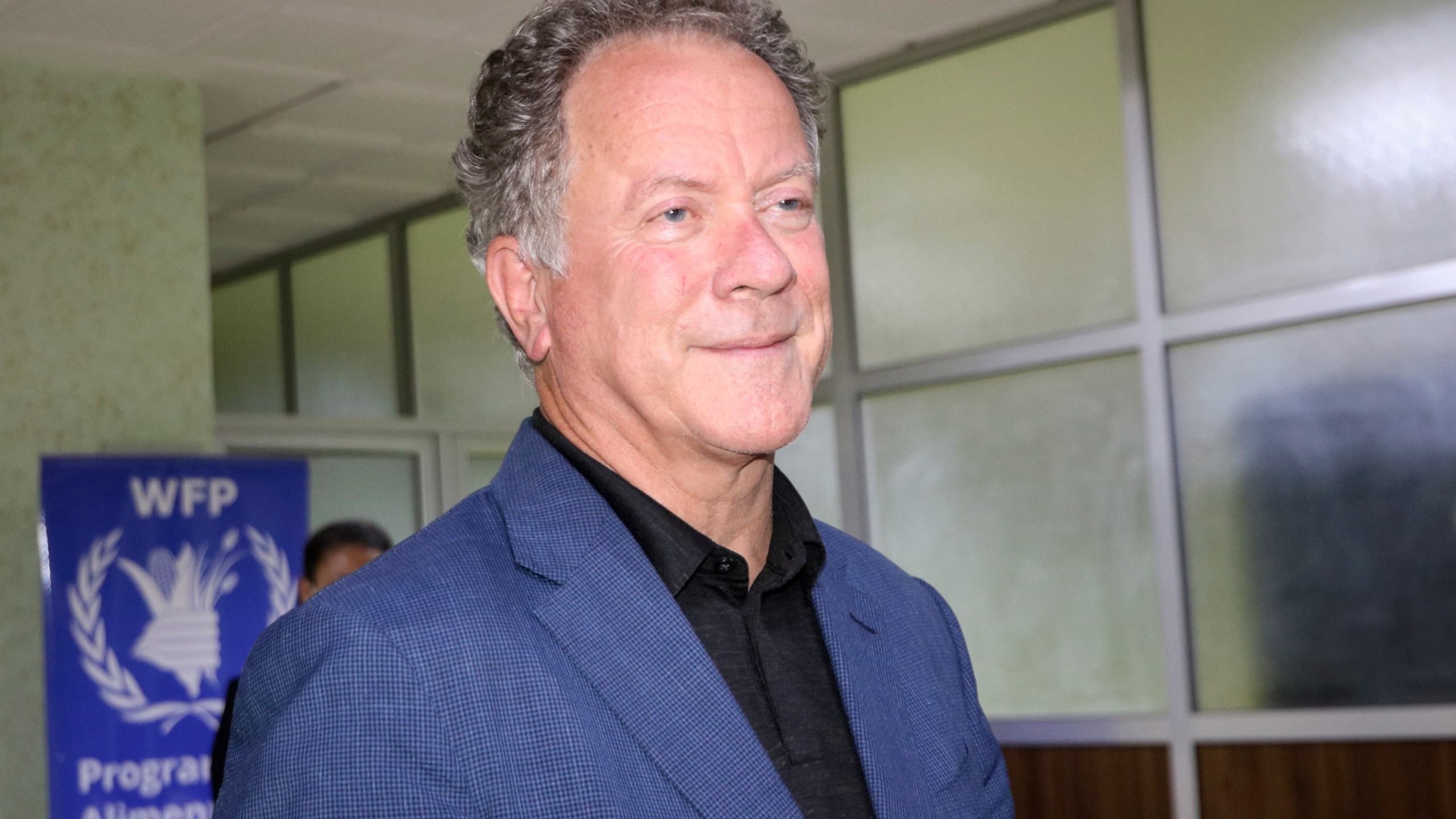 The head of the World Food Program says the Nobel Peace Prize has given the U.N. agency a spotlight and megaphone to warn world leaders that next year is going to be worse than this year, and without billions of dollars “we are going to have famines of biblical proportions in 2021.” David Beasley said in an interview with The Associated Press that the Norwegian Nobel Committee was looking at the work the agency does every day in conflicts, disasters and refugee camps, often putting staffers’ lives at risk to feed millions of hungry people -- but also to send “a message to the world that it’s getting worse out there ... (and) that our hardest work is yet to come.” “It was so timely because we’ve been fighting to get above the choir,” Beasley said of last month's award, pointing to the news being dominated by the U.S. elections and the COVID-19 pandemic, and the difficulty of getting global attention focused on “the travesty that we’re facing around the world.” “So this was really a gift from above,” Beasley said, recalling the surprise and delight of WFP's 20,000 staffers worldwide, and his own shock at being interrupted during a meeting in Niger in Africa's Sahel region with the news. Beasley recalled his warning to the U.N. Security Council in April that as the world was dealing with the coronavirus pandemic, it was also “on the brink of a hunger pandemic” that could lead to “multiple famines of biblical proportions” within a few months if immediate action wasn’t taken. “We were able to avert it in 2020 ... because the world leaders responded with money, stimulus packages, deferral of debt,” he said. Now, Beasley said, COVID-19 is surging again, economies are continuing to deteriorate particularly in low- and middle-income countries, and there is another wave of lockdowns and shutdowns. But he said the money that was available in 2020 isn’t going to be available in 2021, so he has been using the Nobel to meet leaders virtually and in person, talk to parliaments, and give speeches to sensitize those with power to “this tragedy that we are facing -- crises that really are going to be extraordinary over the next, who knows, 12 to 18 months.” “Everybody now wants to meet with the Nobel Peace Prize winner," Beasley said, explaining he now gets 45 minutes instead of 15 minutes with leaders and is able to go into depth and explain how bad things are going to be next year and how leaders are going to have to prioritize programs. “And the response has really been good," he said. “I’m telling them you’re not going to have enough money to fund all the projects you historically fund,” he said. “Those are important things," Beasley said, but he likened the upcoming crisis to the Titanic saying “right now, we really need to focus on icebergs, and icebergs are famine, starvation, destabilization and migration.” Beasley said WFP needs $15 billion next year -- $5 billion just to avert famine and $10 billion to carry out the agency’s global programs including for malnourished children and school lunches which are often the only meal youngsters get. “If I could get that coupled with our normal money, then we avert famine around the world” and minimize destabilization as well as migration. he said. In addition to raising extra money from governments, Beasley said, his other “great hope” is that billionaires that have made billions during the COVID-19 pandemic will step up on a one-time basis. He plans to start pushing this message probably in December or January. In April, Beasley said 135 million people faced “crisis levels of hunger or worse.” A WFP analysis then showed that COVID=19 could push an additional 130 million people “to the brink of starvation by the end of 2020.” He said in Wednesday’s virtual interview from Rome, where WFP is based, that while famine was averted this year, the number of people facing crisis levels of hunger is increasing toward 270 million. “There’s about three dozen countries that could possibly enter the famine conditions if we don’t have the money we need,” Beasley said. According to a joint analysis by WFP and the U.N. Food and Agriculture Organization in October, 20 countries “are likely to face potential spikes in high acute food insecurity” in the next three to six months, “and require urgent attention.” Of those, Yemen, South Sudan, northeastern Nigeria and Burkina Faso have some areas that “have reached a critical hunger situation following years of conflict or other shocks,” the U.N. agencies said, and any further deterioration in coming months “could lead to a risk of famine.” Other countries requiring “urgent attention" are Afghanistan, Cameroon, Central African Republic, Congo, Ethiopia, Haiti, Lebanon, Mali, Mozambique, Niger, Sierra Leone, Somali, Sudan, Syria, Venezuela, Zimbabwe, they said. Beasley said a COVID-19 vaccine “will create some optimism that hopefully will help jump the economies around the world, particularly the Western economies. But the WFP executive director said there’s already been $17 billion of economic stimulus this year “and we're not going to have that globally." “We’re very, very, very concerned” that with deferred debt payments for low- and middle-income countries resuming in January, new lockdowns and the rippling economic impact, “2021’s going to be a very bad year,” Beasley said.