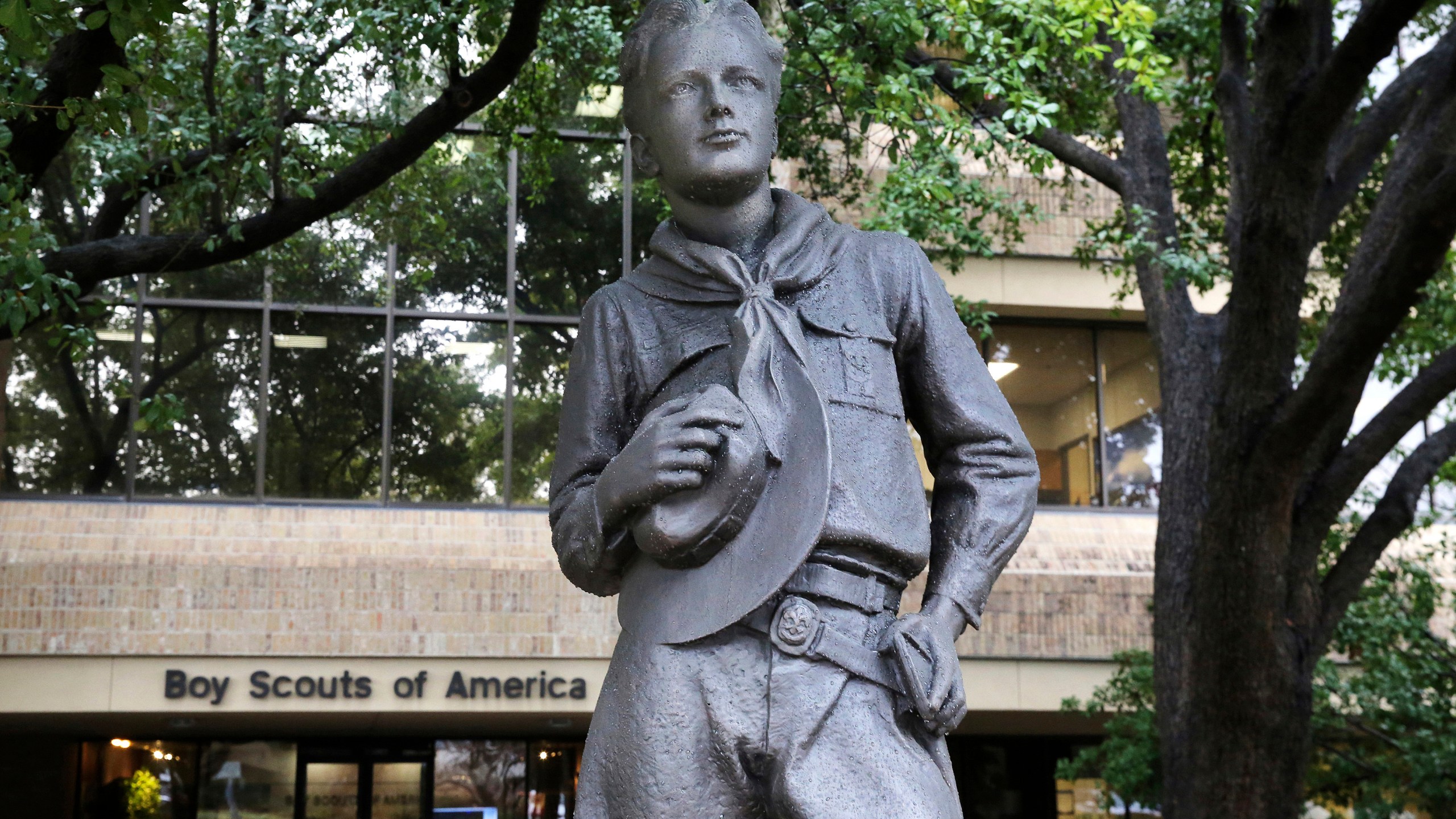 In this Feb. 12, 2020 file photo, a statue stands outside the Boys Scouts of America headquarters in Irving, Texas. Close to 90,000 sex-abuse claims have been filed against the Boy Scouts of America as the deadline arrived Monday, Nov. 16 for filing claims in the BSA’s bankruptcy case. The number far exceeded initial projections of lawyers across the United States who have been signing up clients in the case since the Boy Scouts filed for bankruptcy protection in February in the face of hundreds of lawsuits. (AP Photo/LM Otero, File)