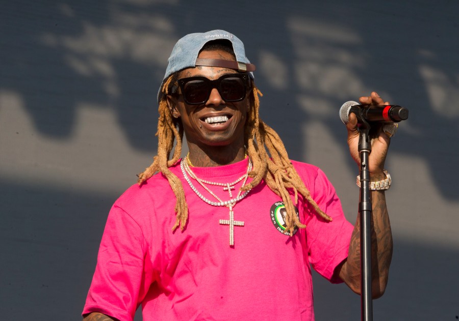 In this June 16, 2018, file photo, Lil Wayne performs on Day 3 of the 2018 Firefly Music Festival at The Woodlands in Dover, Del. (Owen Sweeney/Invision via AP)