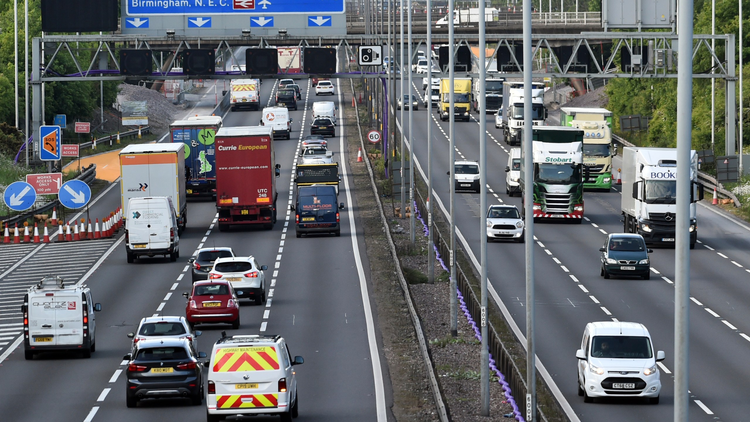 In this May 18, 2020, file photo, traffic moves along the M6 motorway near Birmingham, England. (AP Photo/Rui Vieira, File)