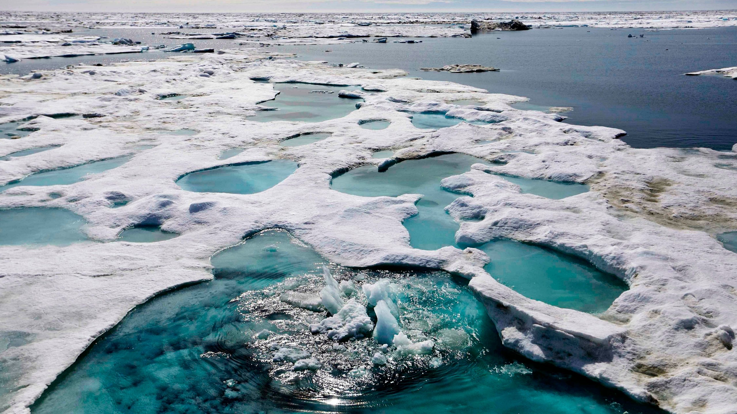 In this July 16, 2017, file photo, ice is broken up by the passing of the Finnish icebreaker MSV Nordica as it sails through the Beaufort Sea off the coast of Alaska. (David Goldman/AP Photo)