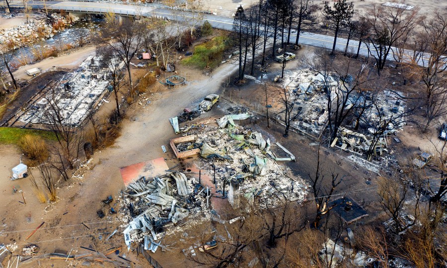 In this photo taken by a drone, homes destroyed by the Mountain View Fire line a street in the Walker community in Mono County, Calif., on Nov. 18, 2020. (Noah Berger / Associated Press)