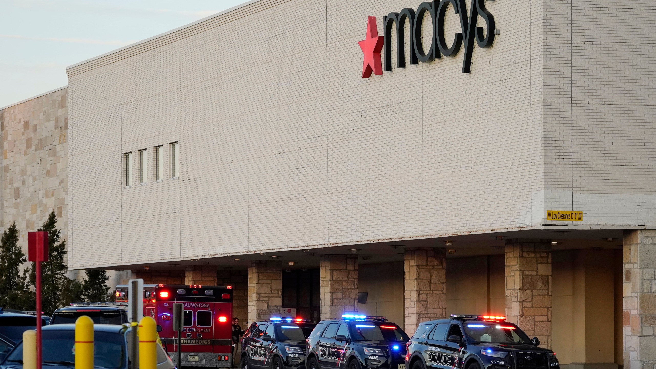 Police investigate a shooting at the Mayfair Mall on Nov. 20, 2020, in Wauwatosa, Wis. (AP Photo/Nam Y. Huh)