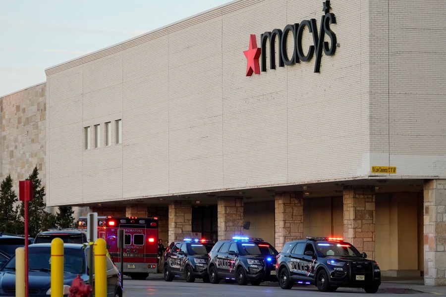 Police investigate a shooting at the Mayfair Mall on Nov. 20, 2020, in Wauwatosa, Wis. (AP Photo/Nam Y. Huh)