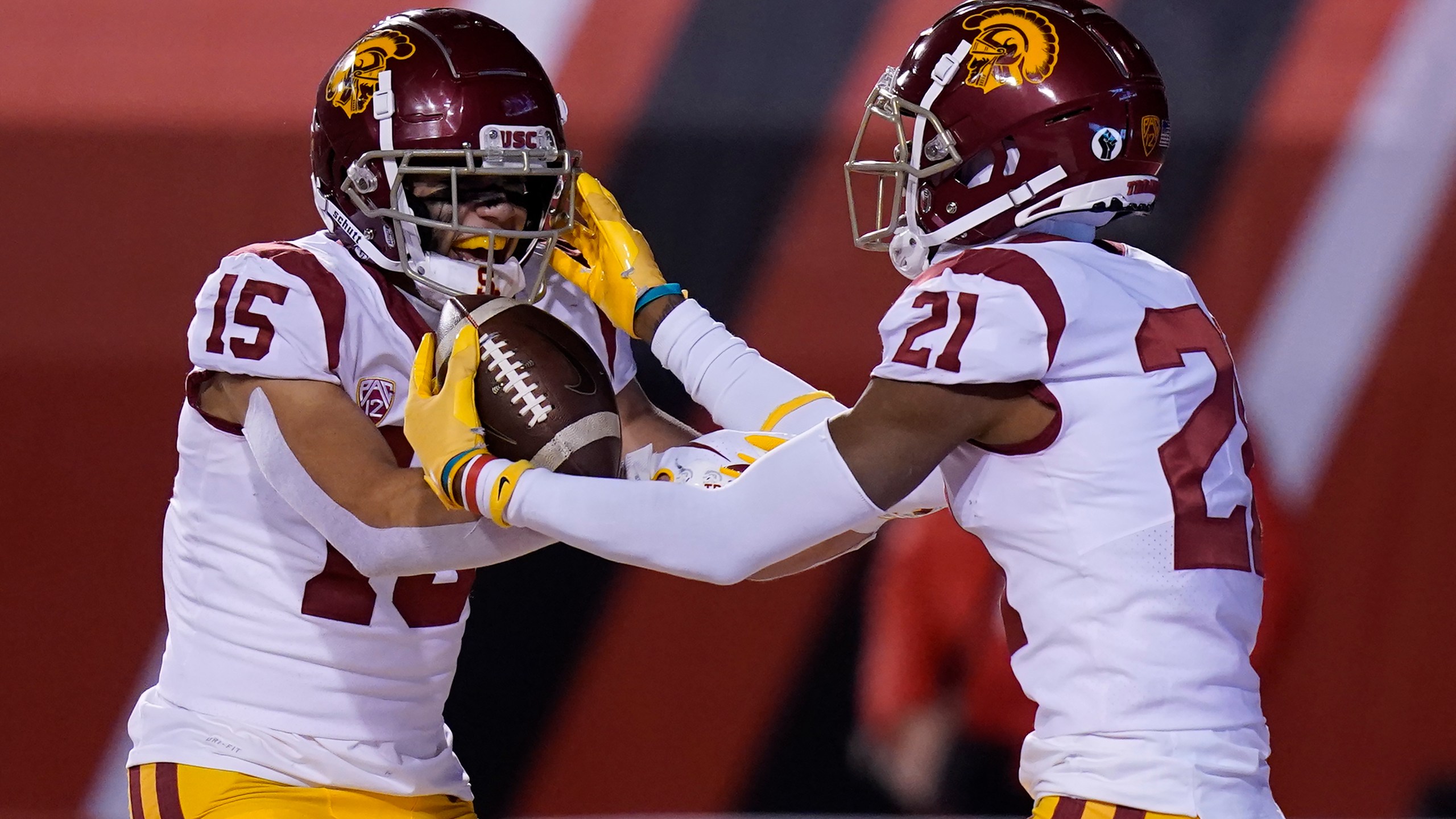 Southern California's Tyler Vaughns (21) celebrates his touchdown against Utah with Drake London (15) during the first half of an NCAA college football game on Nov. 21, 2020, in Salt Lake City. (AP Photo/Rick Bowmer)