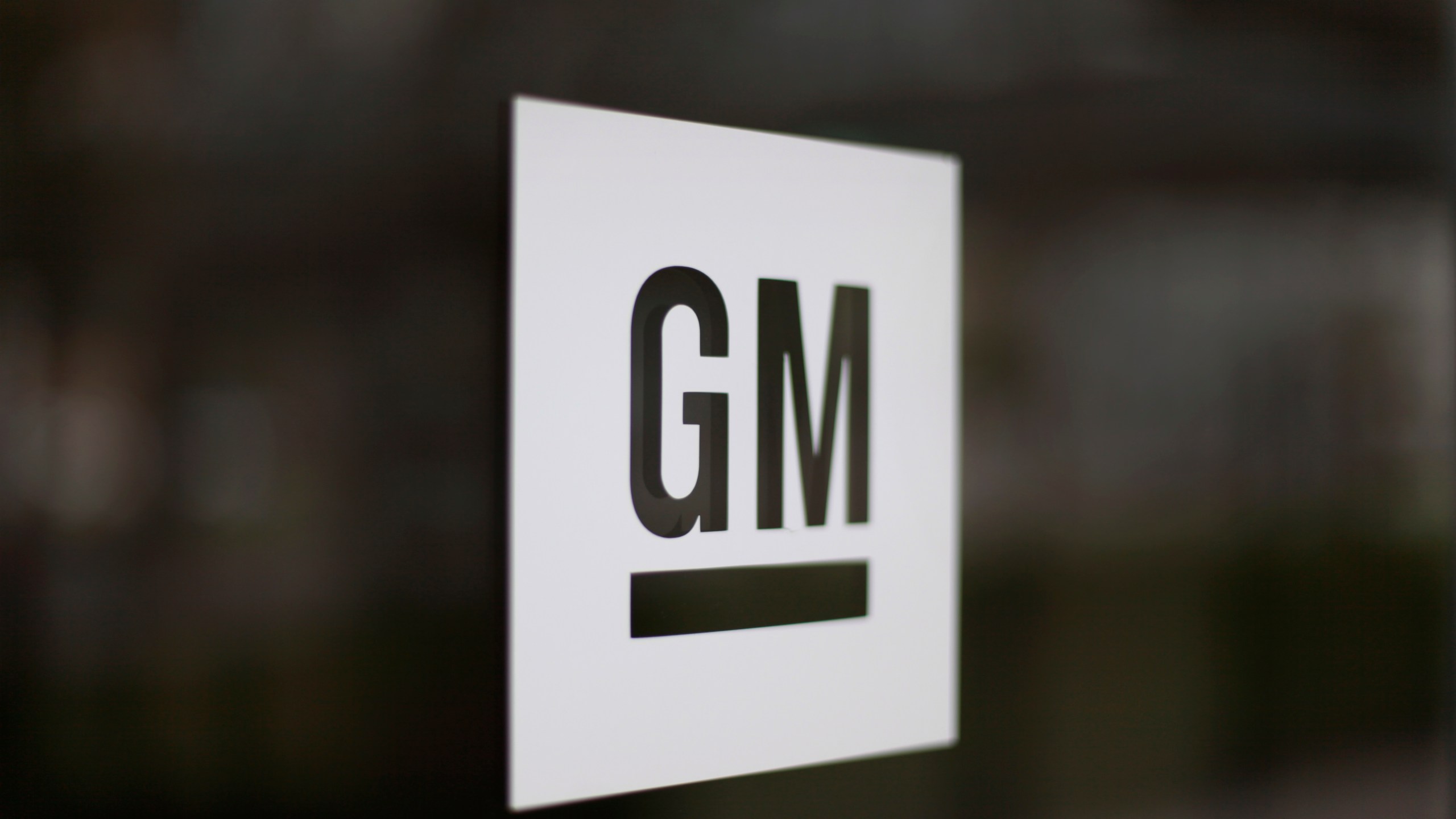 This May 16, 2014, file photo, shows the General Motors logo at the company's world headquarters in Detroit. (AP Photo/Paul Sancya, File)