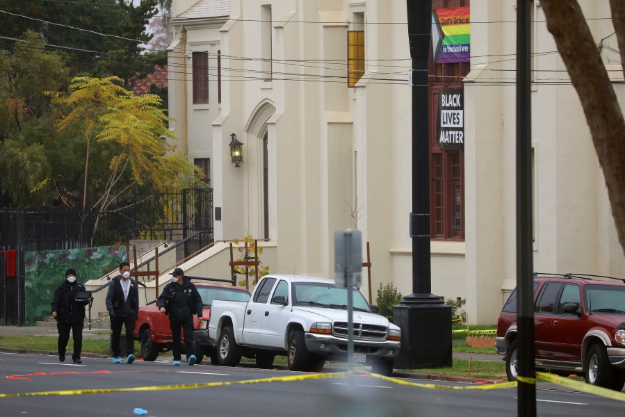 Members of the San Jose Police Department investigate a homicide scene at Grace Baptist Church in San Jose on Nov. 23, 2020. (Aric Crabb / Bay Area News Group via Associated Press)