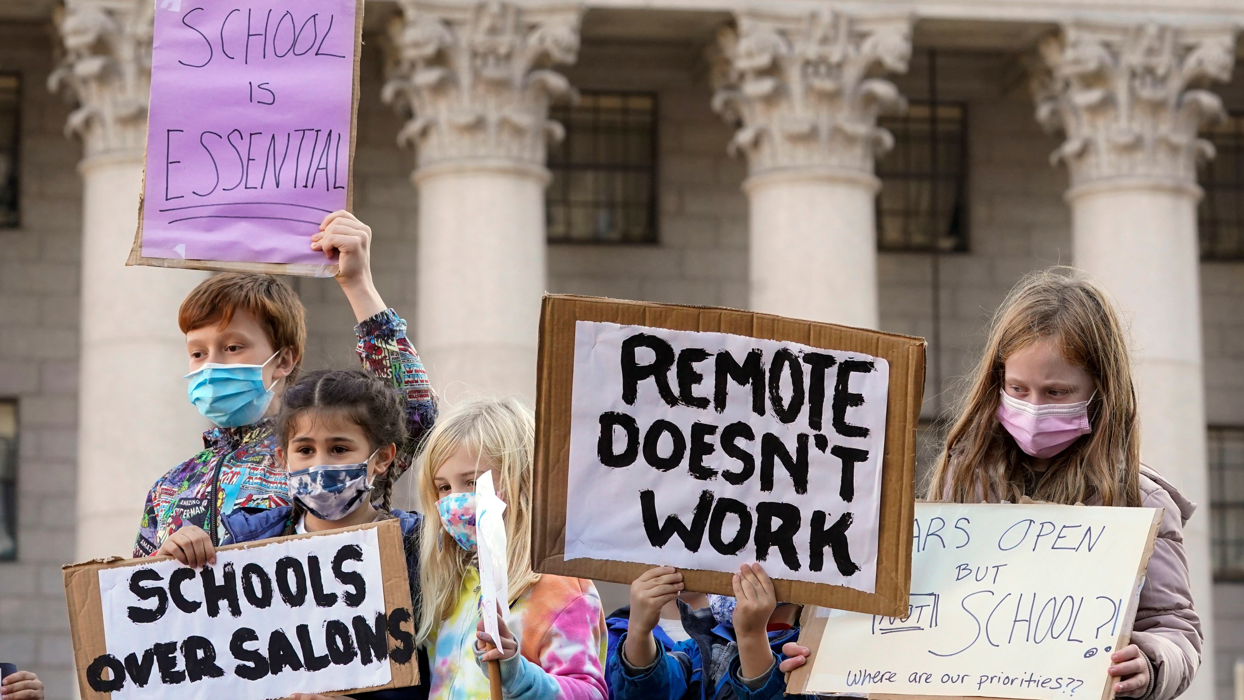 In this Nov. 14, 2020, photo, students demonstrate during a rally to call on New York Mayor Bill de Blasio to keep schools open. (AP Photo/Mary Altaffer, File)