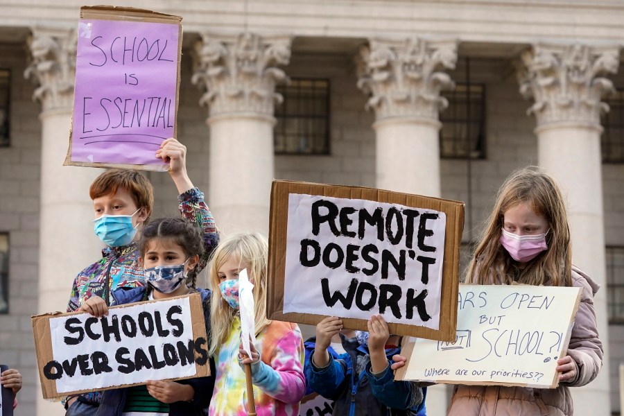 In this Nov. 14, 2020, photo, students demonstrate during a rally to call on New York Mayor Bill de Blasio to keep schools open. (AP Photo/Mary Altaffer, File)