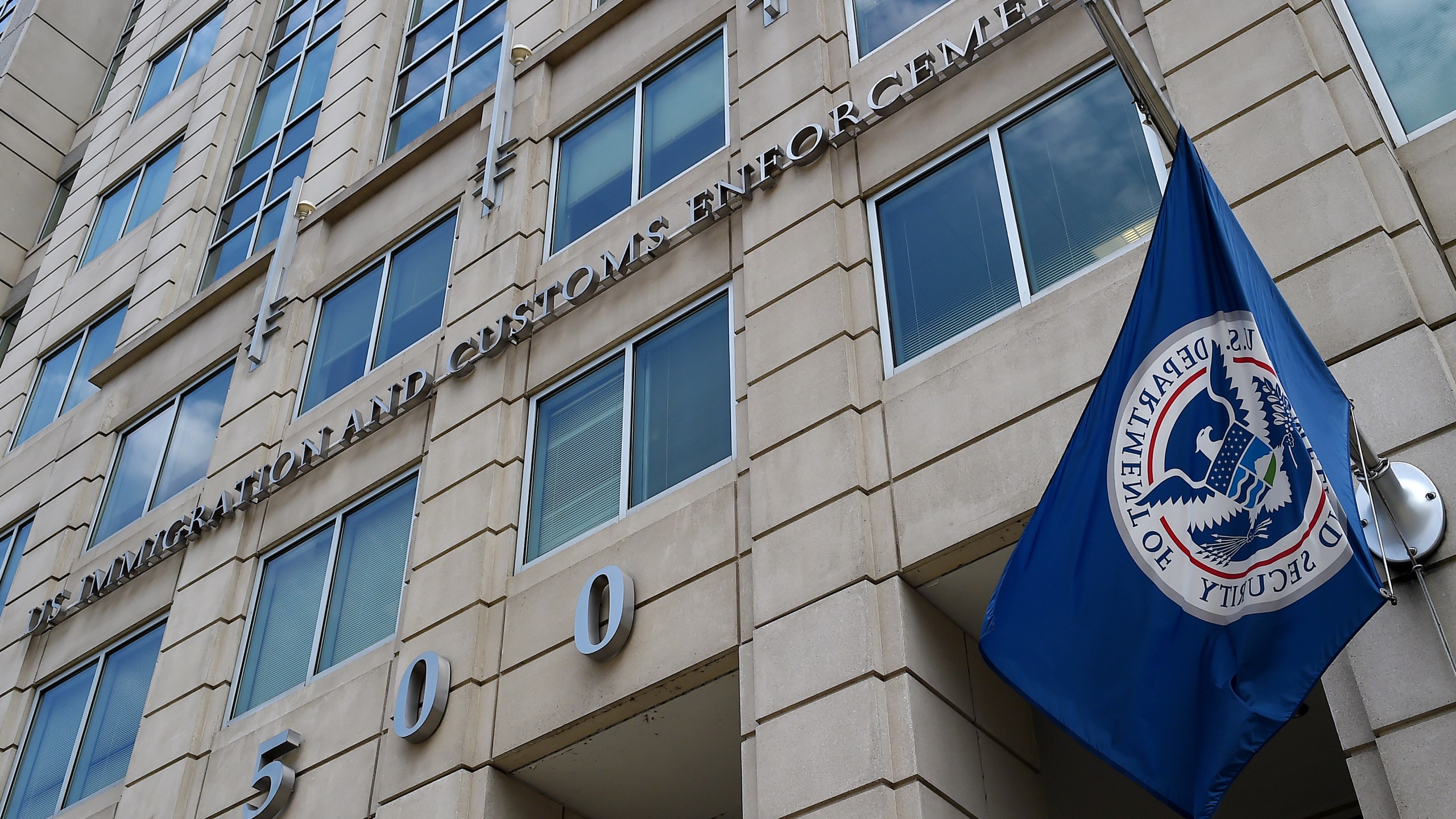 The Department of Homeland Security flag flies outside the Immigration and Customs Enforcement (ICE) headquarters in Washington, DC, on July 17, 2020. (Olivier Douliery/AFP via Getty Images)