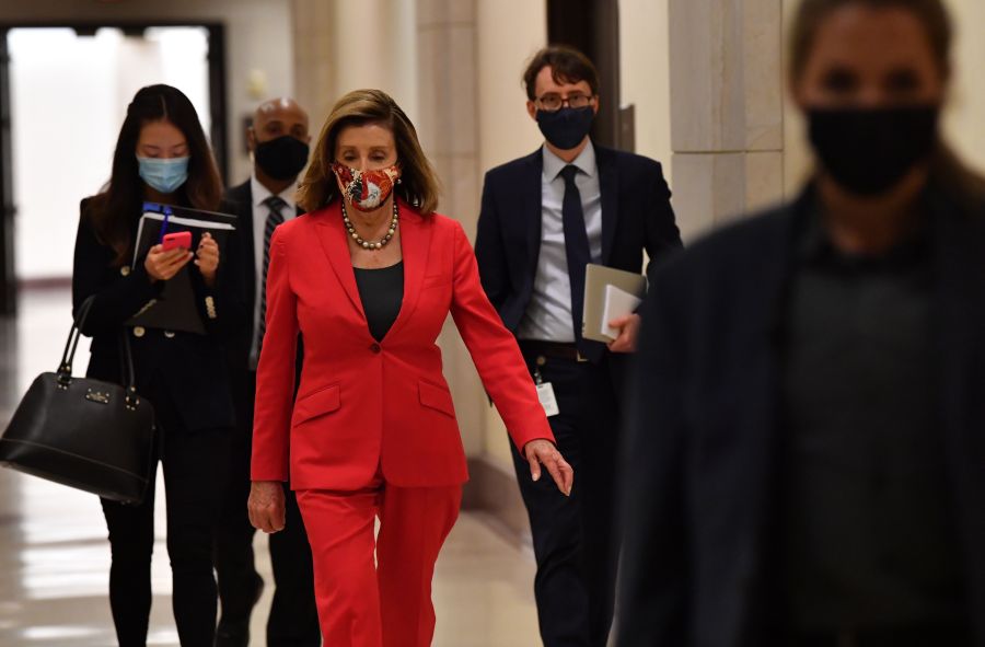 U.S. Speaker of the House, Nancy Pelosi, Democrat of California, leaves after her weekly press briefing on Capitol Hill in Washington, D.C., on Nov. 6, 2020. (NICHOLAS KAMM/AFP via Getty Images)