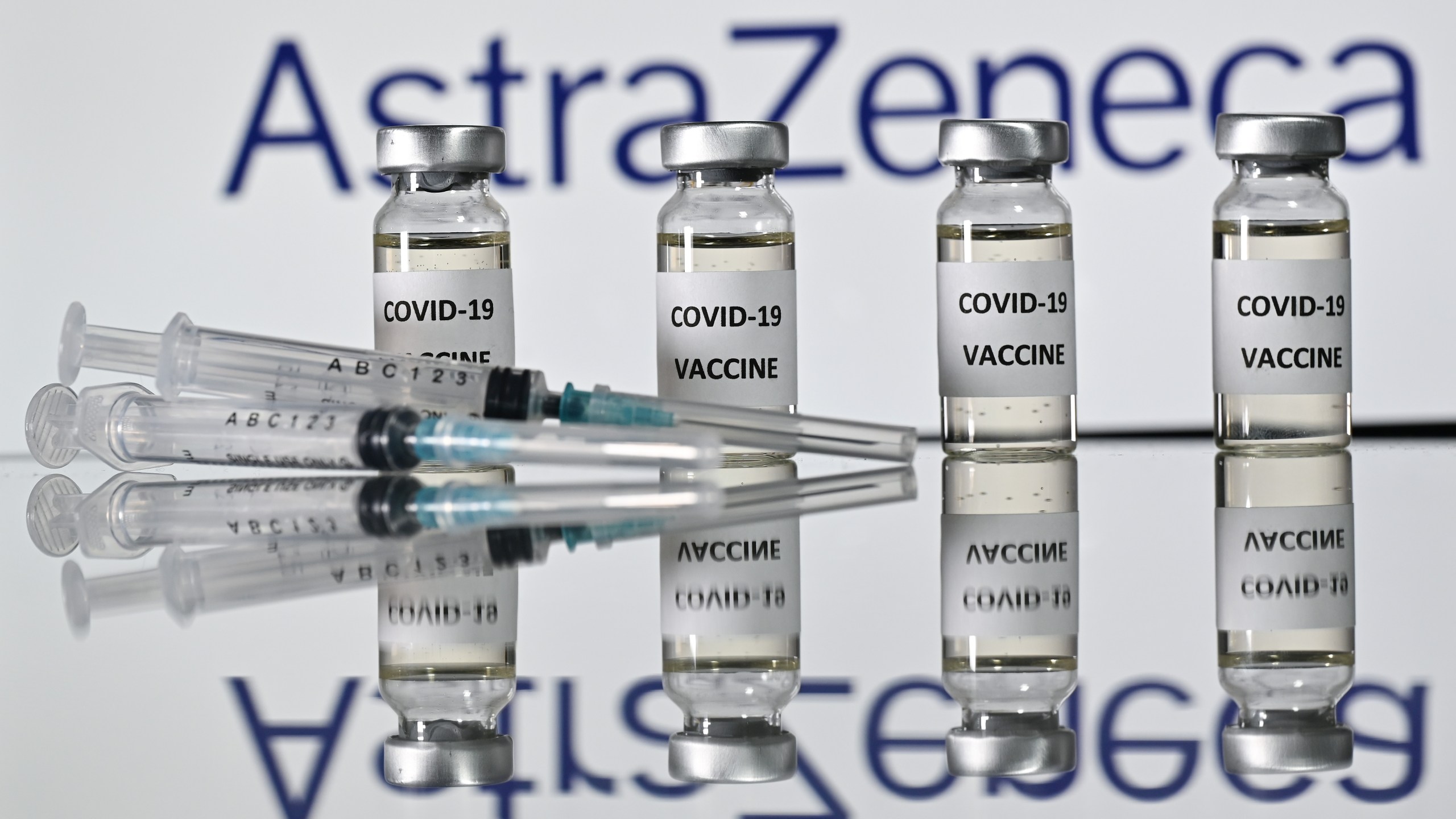 An illustration picture shows vials with COVID-19 Vaccine stickers attached and syringes with the logo of British pharmaceutical company AstraZeneca on Nov. 17, 2020. (Justin Tallis/AFP via Getty Images)