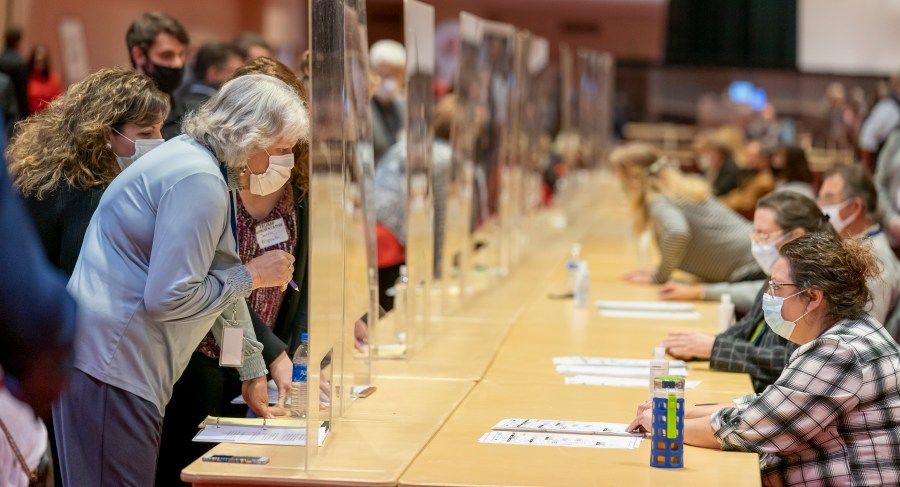 Representatives for President Donald Trump, left, look over a ballots during the presidential recount vote for Dane County on Nov. 20, 2020 in Madison, Wisc. President Donald Trump requested a recount of ballots in Milwaukee and Dane counties in Wisconsin, hoping to overturn his narrow defeat in the state to Democratic presidential nominee Joe Biden. Trump's campaign paid the state $3 million to cover the cost of the recount. (Andy Manis/Getty Images)