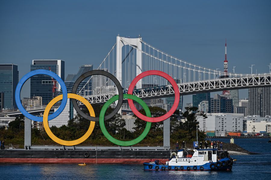 The Olympic rings are reinstalled at the waterfront in Tokyo on Dec. 1, 2020. (CHARLY TRIBALLEAU/AFP via Getty Images)