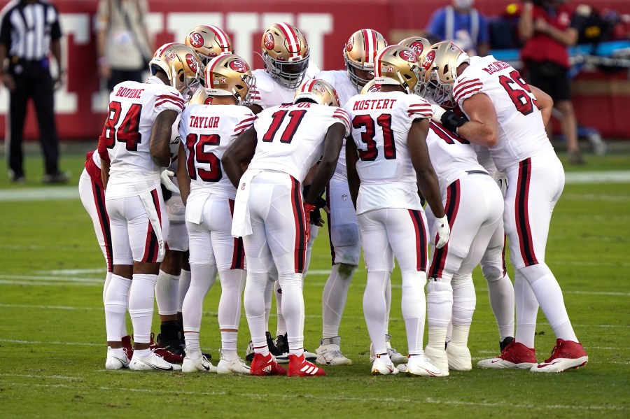 The San Francisco 49ers huddle against the Los Angeles Rams during the first quarter at Levi's Stadium on October 18, 2020 in Santa Clara. (Thearon W. Henderson/Getty Images)