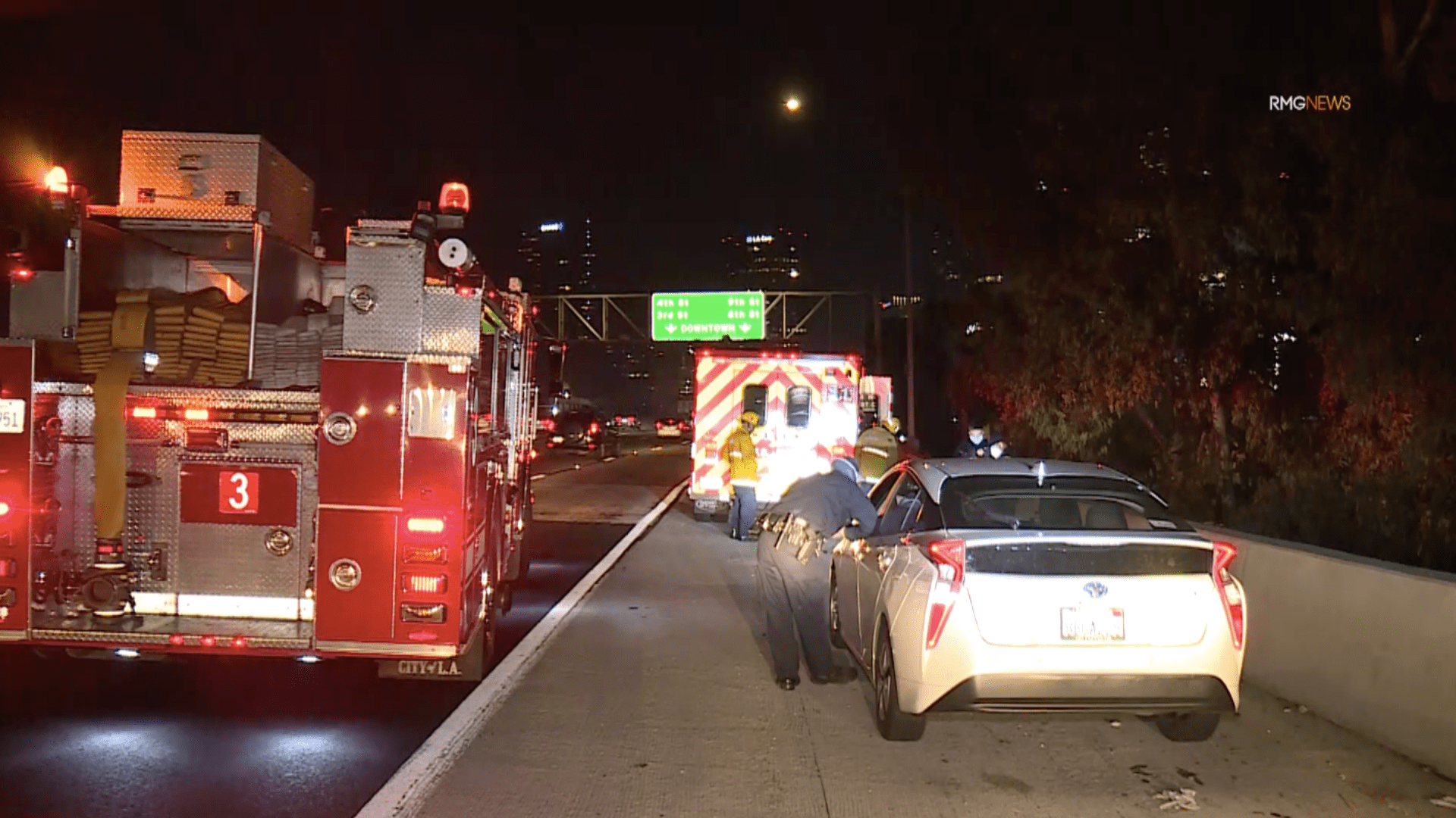 Authorities respond to a car shooting on the 110 Freeway in downtown Los Angeles on Nov. 20, 2020. (RMG News)