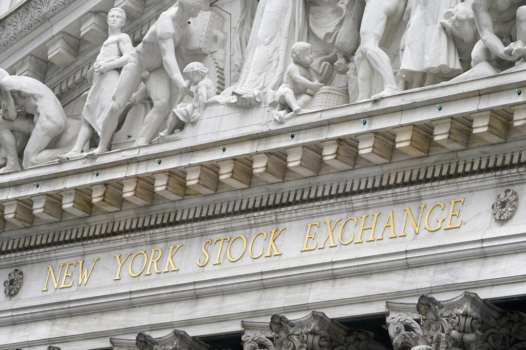 The sign is displayed at the New York Stock Exchange in New York, Monday, Nov. 23, 2020. (AP Photo/Seth Wenig)