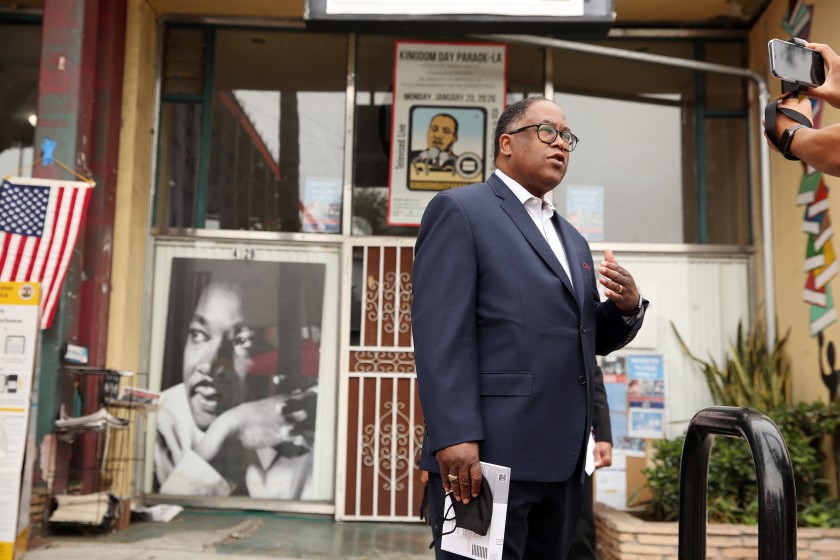 Los Angeles City Council candidate Mark Ridley-Thomas speaks to reporters before voting at Hot and Cool Cafe in Leimert Park on Nov. 3, 2020. (Dania Maxwell / Los Angeles Times)