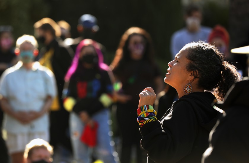 Melina Abdullah, co-founder of the Los Angeles chapter of Black Lives Matter, speaks at a demonstration outside Mayor Eric Garcetti’s house on Nov. 30, 2020. (Christina House/Los Angeles Times)