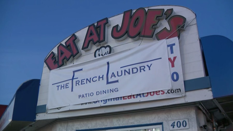 Iconic Redondo Beach Bay diner Eat at Joe's has a banner up on the outside of the diner that reads The French Laundry Patio Dining, a riff on Gov. Gavin Newsom’s new coronavirus restrictions and his infamous dinner party.