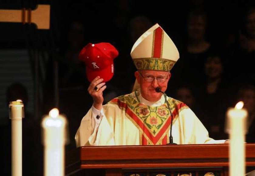 The suit by Bishop Kevin Vann, seen here at his 2012 installation, seeks a retraction and money from the former administrator of a church-affiliated charity. (Genaro Molina / Los Angeles Times)