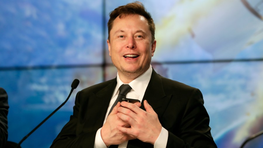 In this Jan. 19, 2020, file photo, Elon Musk founder, CEO, and chief engineer/designer of SpaceX speaks during a news conference after a Falcon 9 SpaceX rocket test flight to demonstrate the capsule's emergency escape system at the Kennedy Space Center in Cape Canaveral, Fla. (John Raoux / Associated Press)