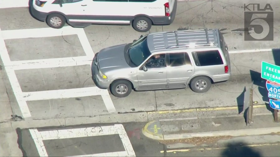 The driver of a gray Lincoln Navigator leads California Highway Patrol officers on a pursuit on the 405 Freeway. (Sky5)