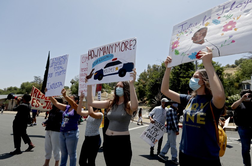 Protesters in June called for Los Angeles County Dist. Atty. Jackie Lacey to be removed from office. Voters appeared to do just that this week, with her challenger poised to win his bid to oust her.(Luis Sinco / Los Angeles Times)