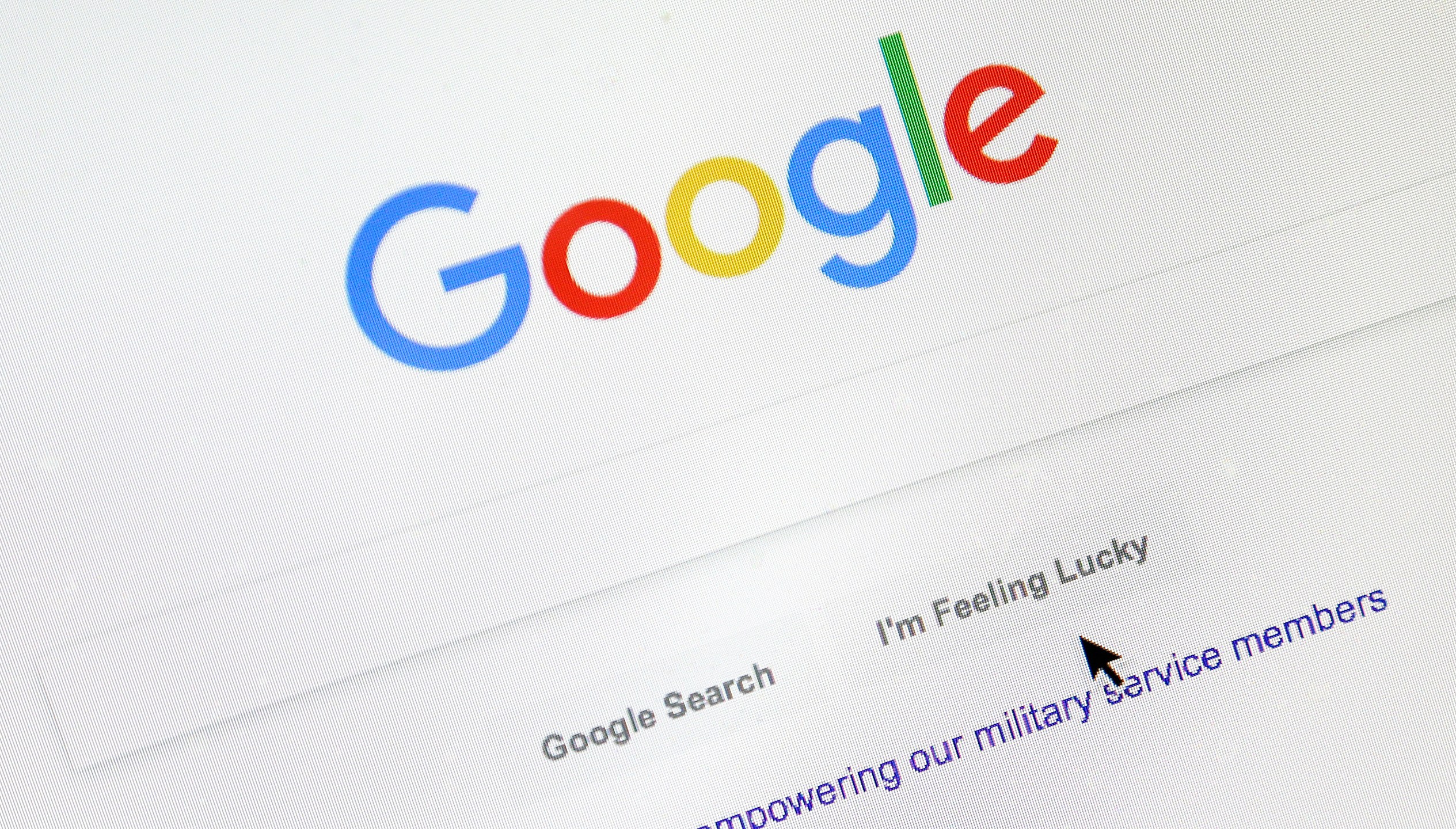 In this Aug. 28, 2018, file photo, a cursor moves over Google's search engine page, in Portland, Ore. (AP Photo/Don Ryan, File)