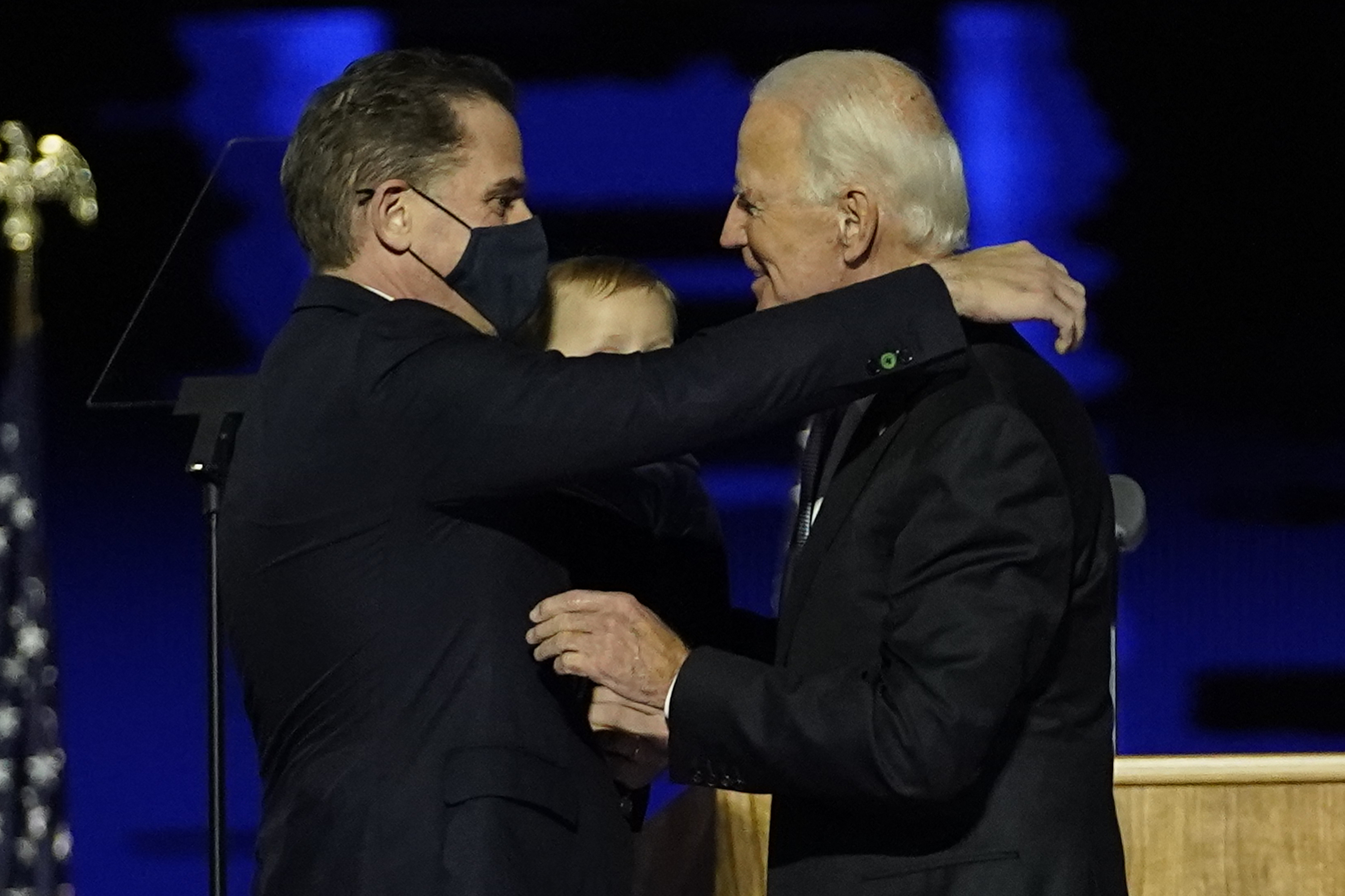 President-elect Joe Biden, right, embraces his son Hunter Biden, left, Saturday, Nov. 7, 2020, in Wilmington, Del. (Andrew Harnik/AP Photo)