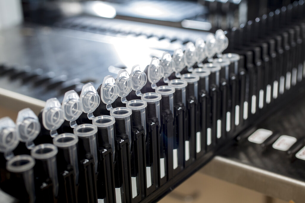 This Wednesday, July 22, 2020, photo provided by C2N Diagnostics shows equipment in a lab that analyzes blood samples at the company's facility in the Center for Emerging Technologies in St. Louis. (Jerry Naunheim Jr./C2N Diagnostics via AP)