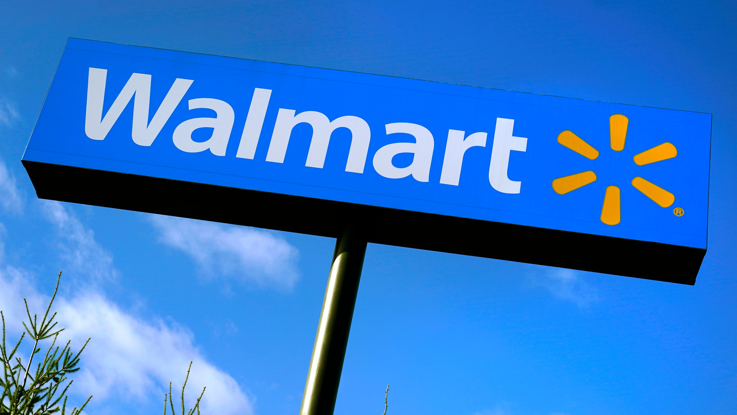 A Walmart store sign is visible from Route 28, Wednesday, Nov. 18, 2020, in Derry, N.H. (AP Photo/Charles Krupa)