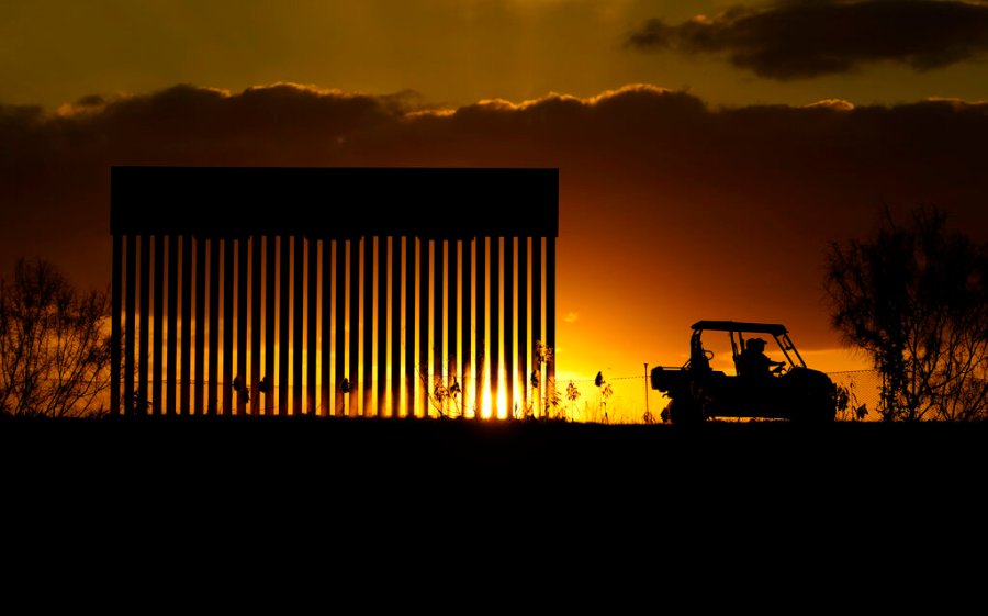 Authorities pass a border wall construction site, in Mission, Texas, Monday, Nov. 16, 2020. (AP Photo/Eric Gay)