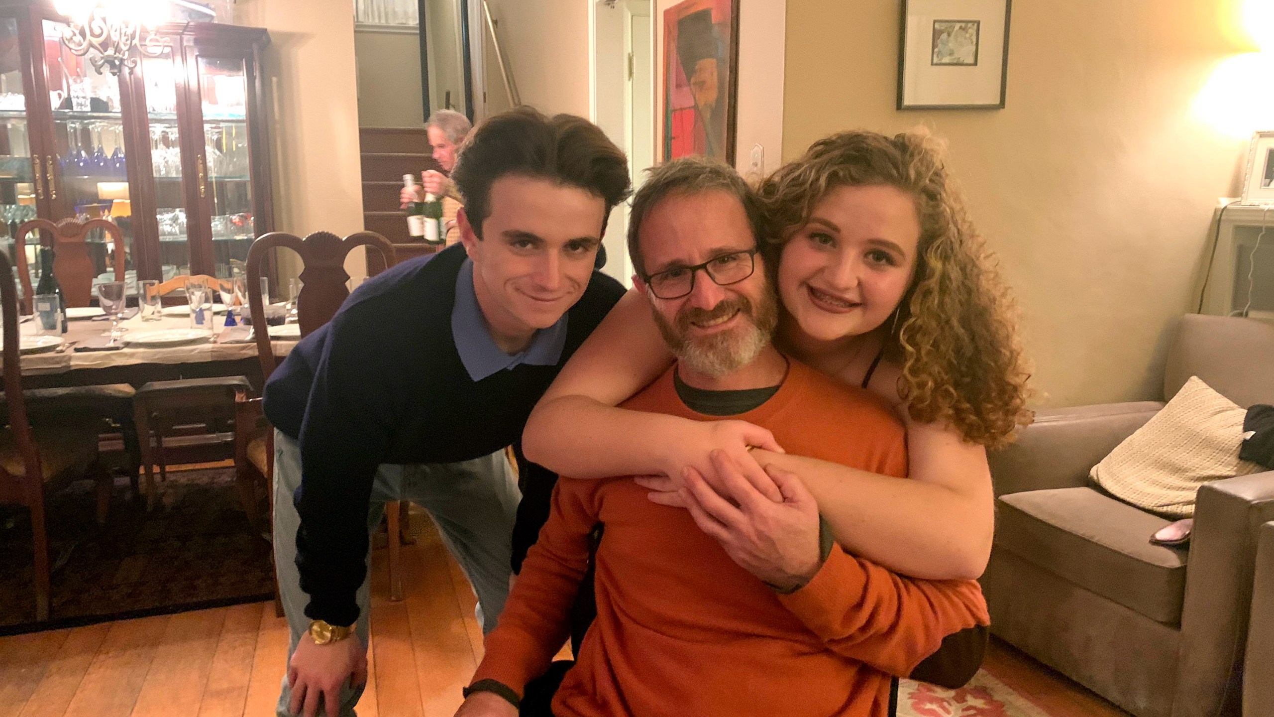 In this November 2019 photo provided by Samuel Kolb, he poses for a photo with his son Jacob and daughter Lexi in San Mateo, Calif. (Elizabeth Robillard/Courtesy of Samuel Kolb via AP)