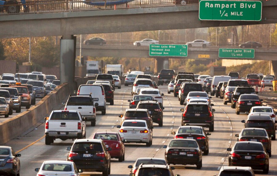 In this Dec. 12, 2018, file photo, traffic moves along the Hollywood Freeway in Los Angeles. (AP Photo/Damian Dovarganes, File)