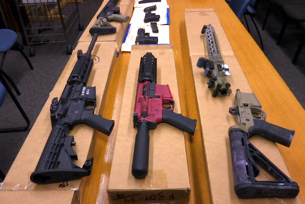 This Nov. 27, 2019, file photo shows "ghost guns" on display at the headquarters of the San Francisco Police Department in San Francisco. (AP Photo/Haven Daley, File)