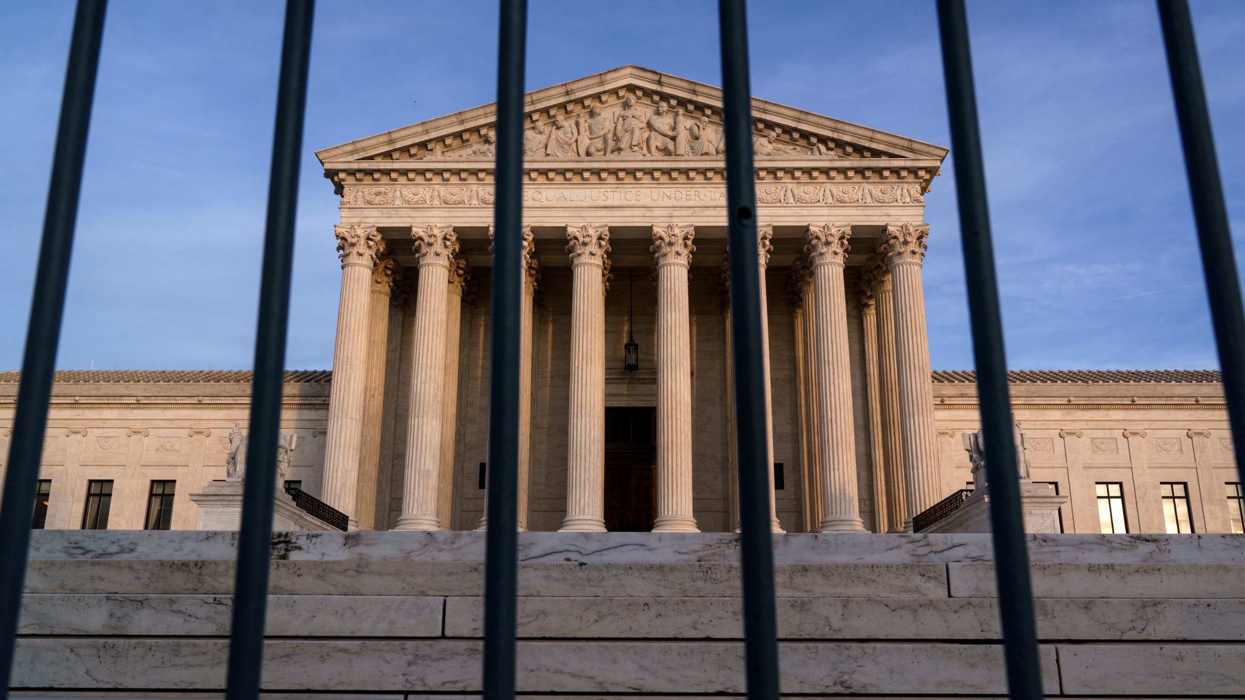 In this Nov. 5, 2020, file photo, the Supreme Court in Washington. The Supreme Court has rejected Republicans' last-gasp bid to reverse Pennsylvania’s certification of President-elect Joe Biden’s victory in the electoral battleground. The court without comment Tuesday, Dec. 8, refused to call into question the certification process in Pennsylvania. (AP Photo/J. Scott Applewhite)