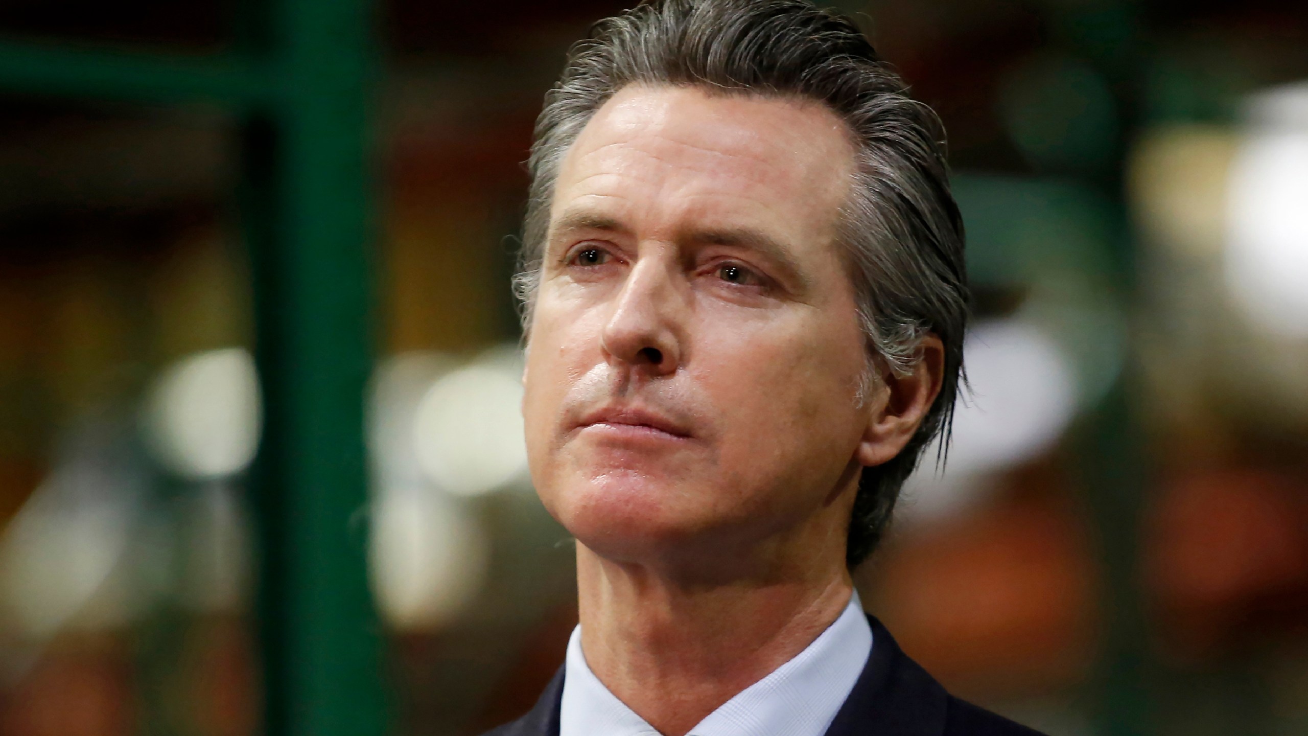 In this June 26, 2020, file photo, California Gov. Gavin Newsom listens to a reporter's question during a news conference in Rancho Cordova, Calif. (AP Photo/Rich Pedroncelli, Pool, File)