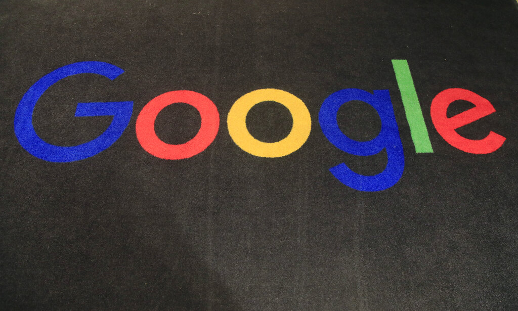 In this Nov. 18, 2019, file photo, the logo of Google is displayed on a carpet at the entrance hall of Google France in Paris. (AP Photo/Michel Euler, File)