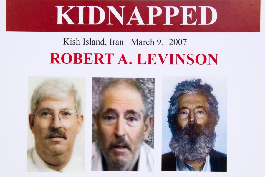 In this March 6, 2012, file photo, an FBI poster showing a composite image of former FBI agent Robert Levinson. (Manuel Balce Ceneta/AP Photo)