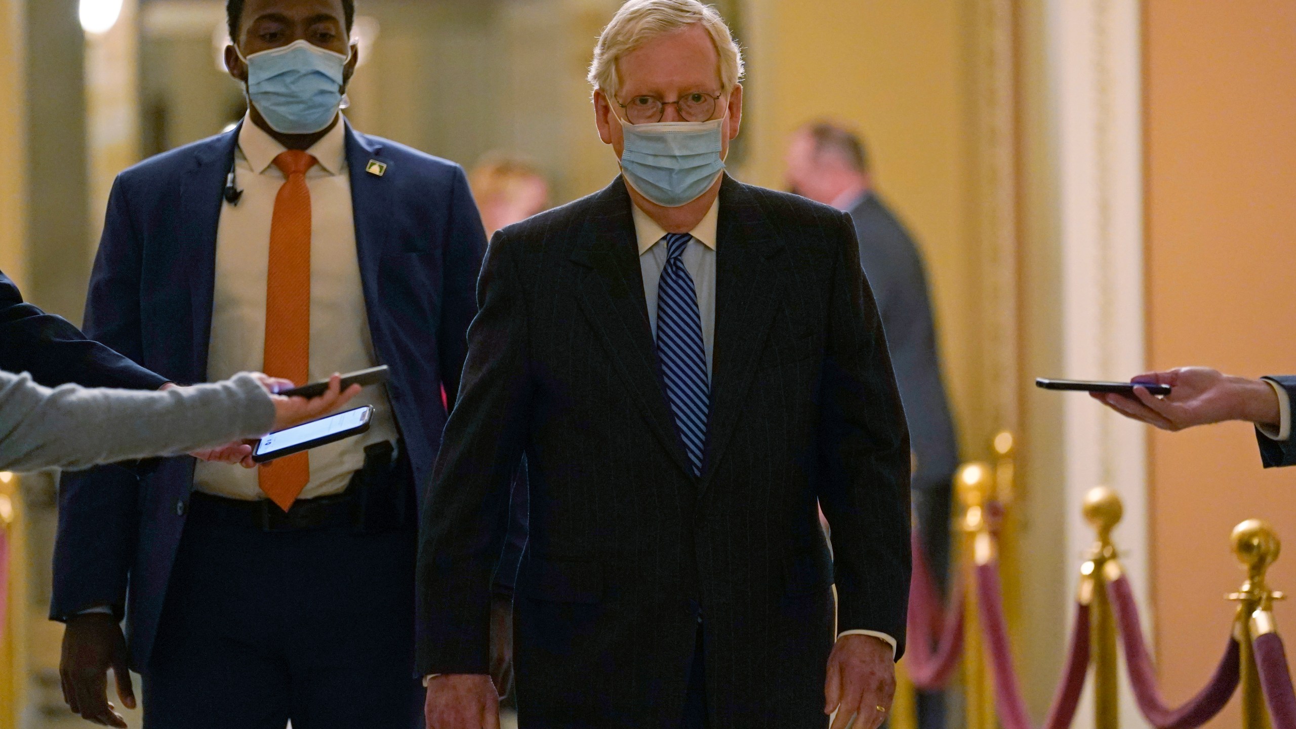 Senate Majority Leader Mitch McConnell of Ky., walks past reporters on Capitol Hill in Washington, Tuesday, Dec. 15, 2020. (Susan Walsh/AP Photo)