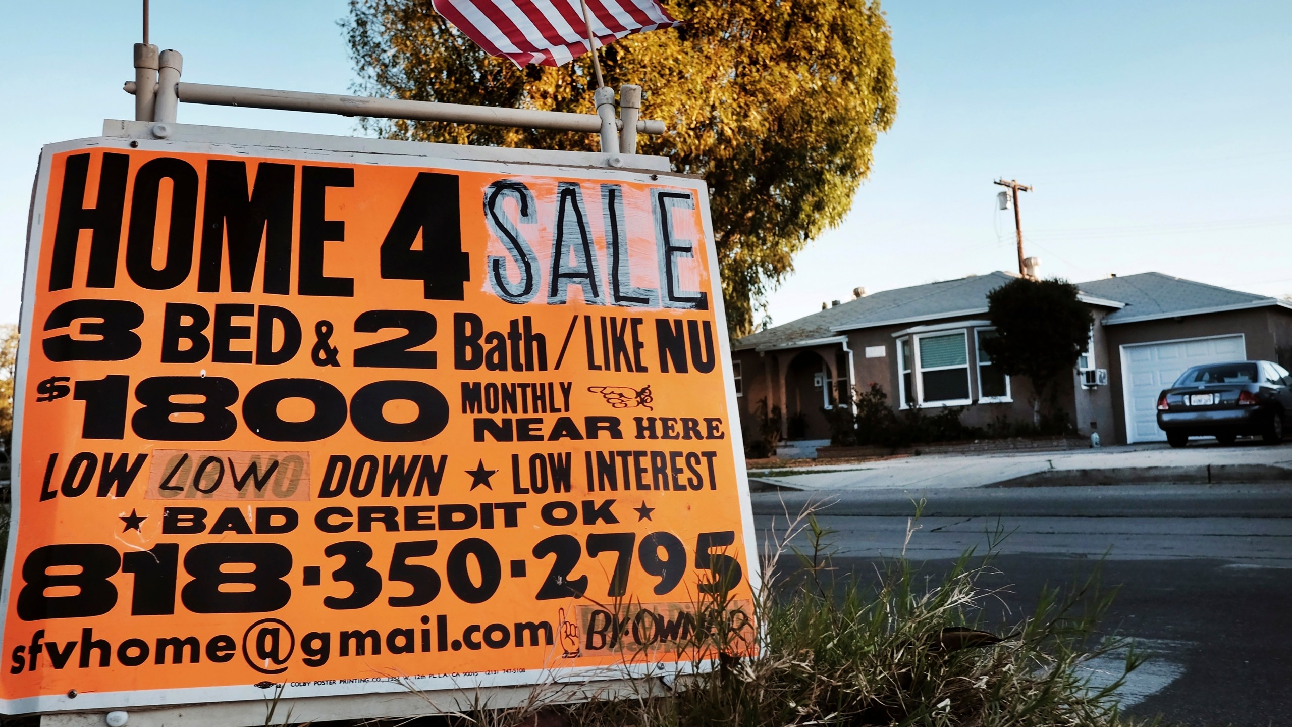 This Jan. 17, 2015, photo shows a sign advertising a house for sale in Los Angeles. (Richard Vogel / Associated Press)