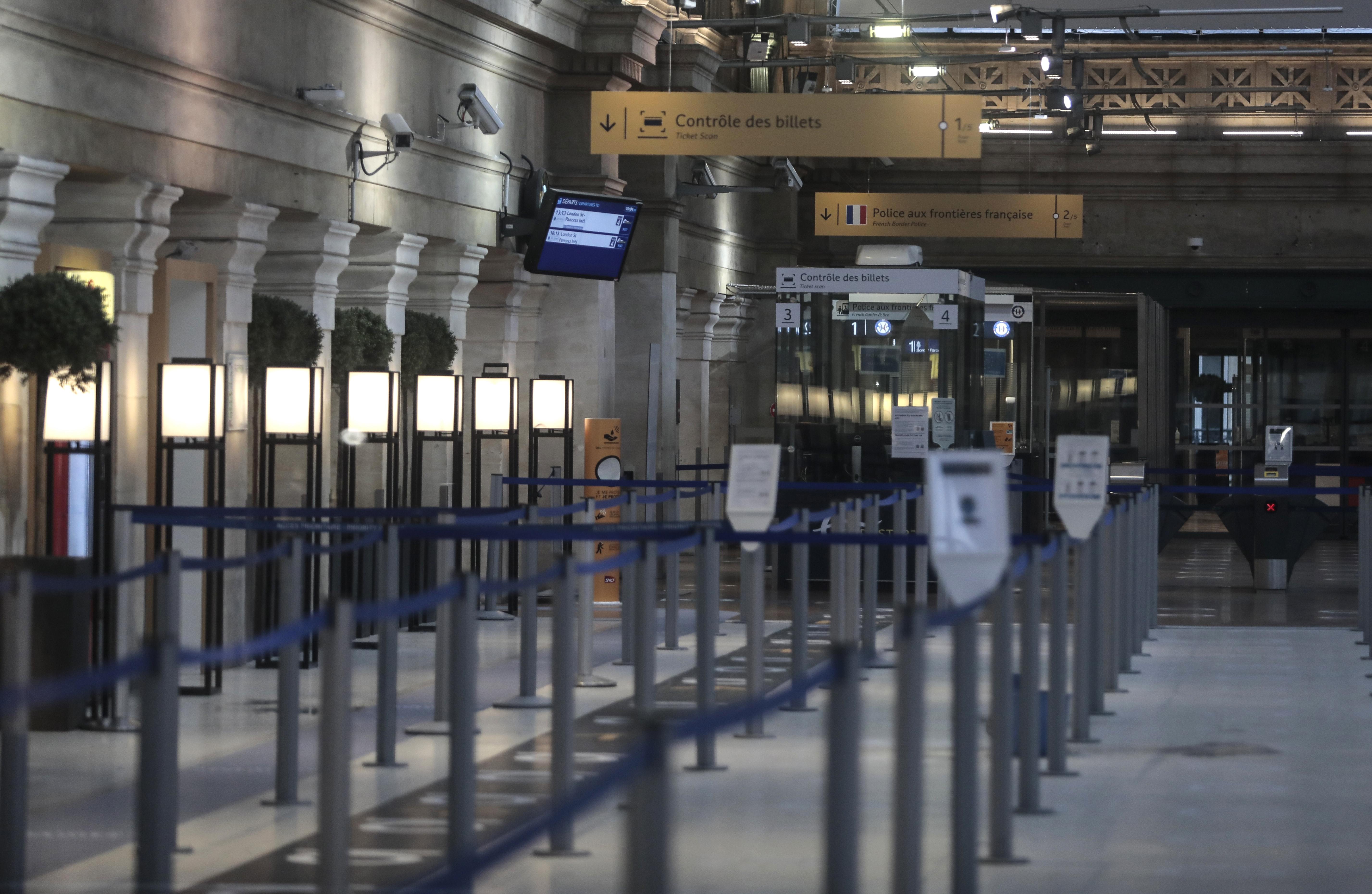 An empty Eurostar Terminal is pictured at Gare du Nord train station in Paris, Monday Dec. 21, 2020. France is banning all travel from the U.K. for 48 hours in an attempt to make sure that a new strain of the coronavirus in Britain doesn't reach its shores. (AP Photo/Lewis Joly)