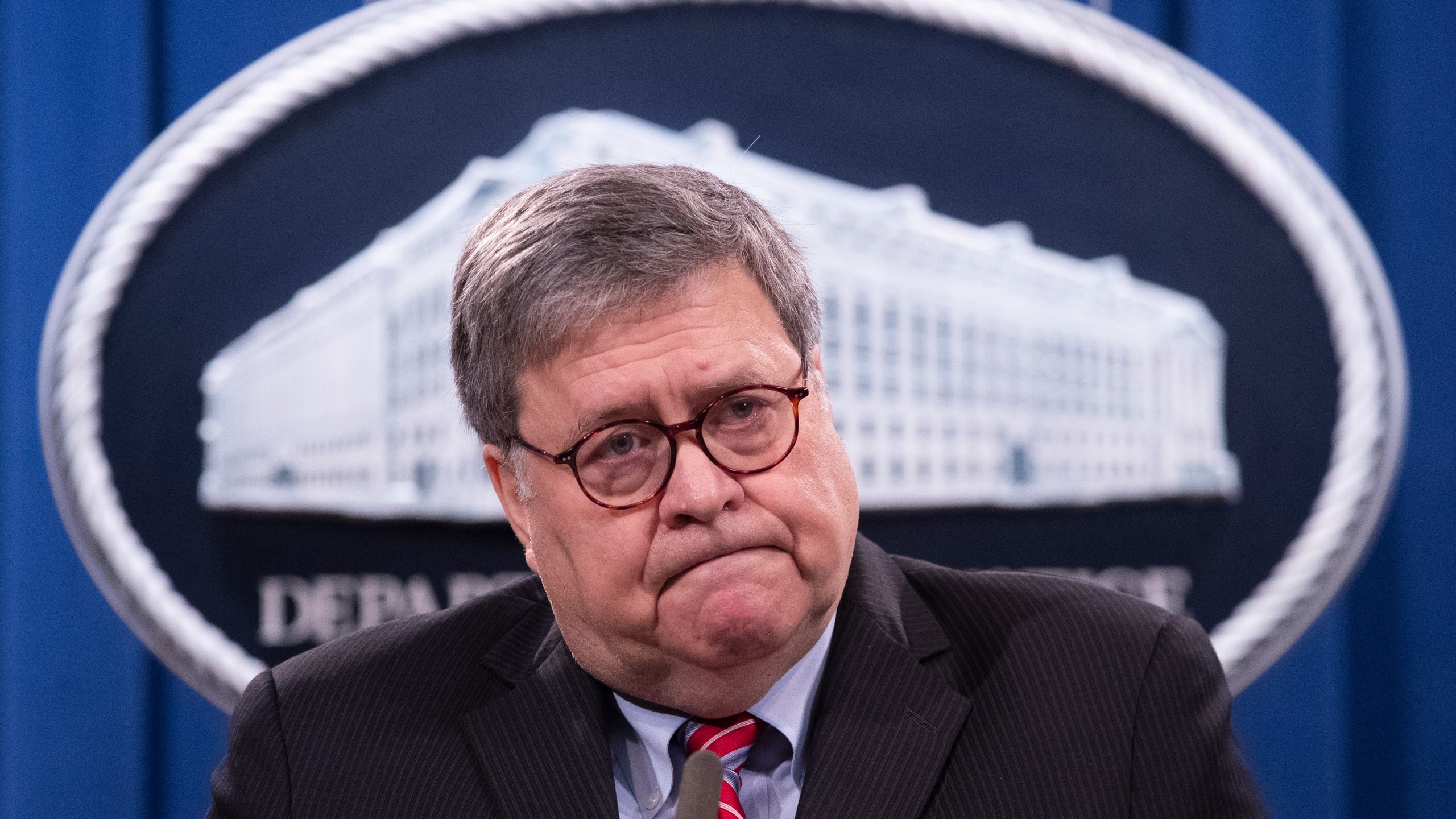 Attorney General William Barr speaks during a news conference at the Justice Department on Dec. 21, 2020. (Michael Reynolds/Pool via Associated Press)